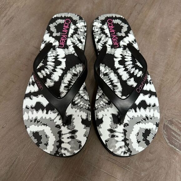 Calvin Klein black and white flip flops. - Picture 6 of 6